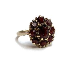 A 9ct gold garnet cluster ring, size N 1/2, 3.5g