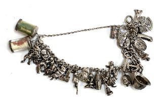 A heavy silver charm bracelet, 112g