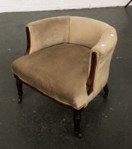 A 19th century tub chair, gold coloured, on turned legs with ceramics casters, 66cmW