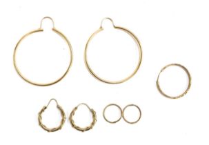 Three pairs of 9ct gold hoop earrings, with one single earrings, gross weight 6.3g