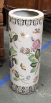 A Chinese style ceramic stick stand, depicting flowers and butterflies, 62cmH