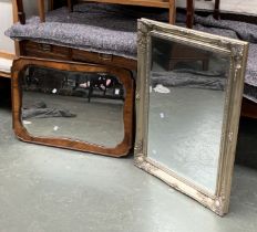 A burr walnut veneer mirror with a shaped bevelled plate, 86x60cm; with one other gilt style mirror