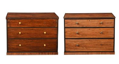 A companion pair of early 20th century rosewood chests of drawers, one a dressing chest with