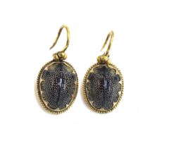 A pair of Victorian gilt metal mounted scarab beetle earrings, 2.8cm long