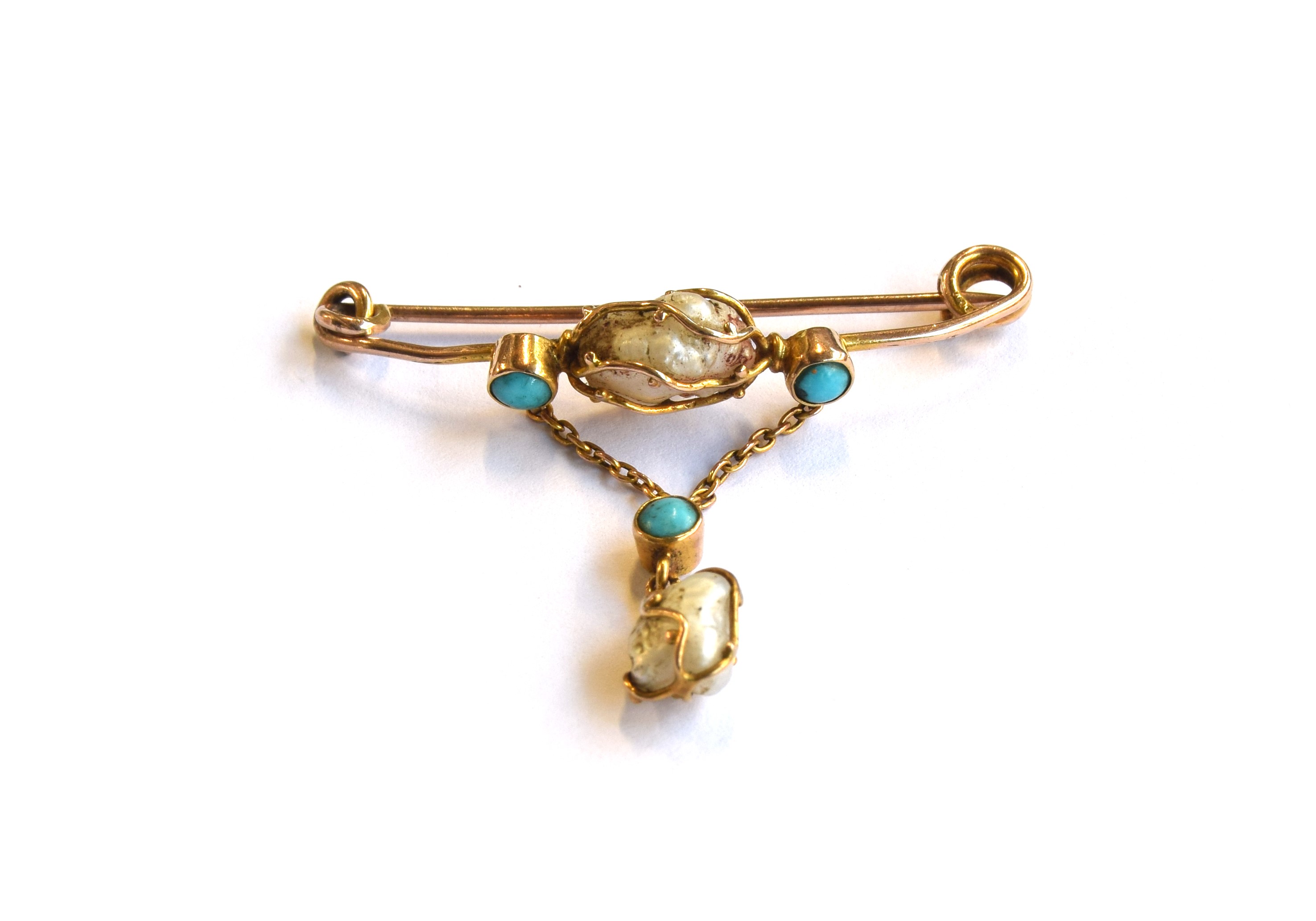 An Art Nouveau Murrle Bennett & Co. 9ct gold, turquoise and baroque pearl wire work lavalier brooch,