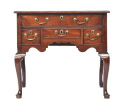 A George III mahogany lowboy, moulded top over one long and three further short drawers, on cabriole
