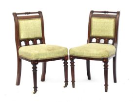 A set of six Victorian gothic dining chairs, turned top rail on scroll back, with barber's pole
