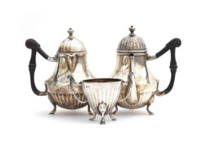 A miniature silver coffee pot, teapot, and sugar bowl, London 1913 and 1914 and Sheffield 1913,