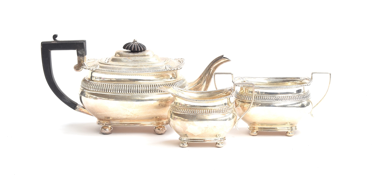 A George V three piece silver tea set by Mappin & Webb, Sheffield 1924, comprising teapot, milk