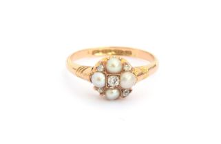 A late Victorian 18ct gold pearl and diamond quatrefoil cluster ring, hallmarked for Birmingham