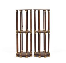 A pair of mahogany and parcel gilt three tier octagonal etageres or plant stands, on reeded