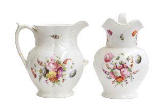 Two large 19th century porcelain ewers, hand painted with floral sprays (af), 32cm high and 30cm
