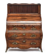 A 19th century Dutch mahogany bureau of bombe form, having a tambour fronted superstructure, over
