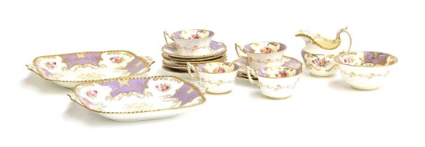 A quantity of Coalport batwing pattern teawares in lilac, comprising teacups (4), saucers (6),