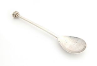 A silver Arts and Crafts style seal topped spoon by Guild of Handicraft, London 2001, with planished
