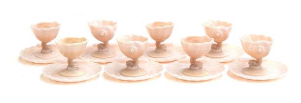 A set of eight Art Deco Cambridge Crown Tuscan pink milk glass trifle dishes and plates, in the form