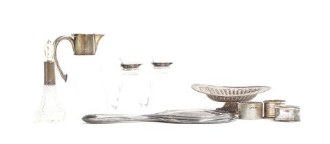 A mixed lot, to include a silver backed looking glass, Birmingham 1921; a white metal bonbon dish;