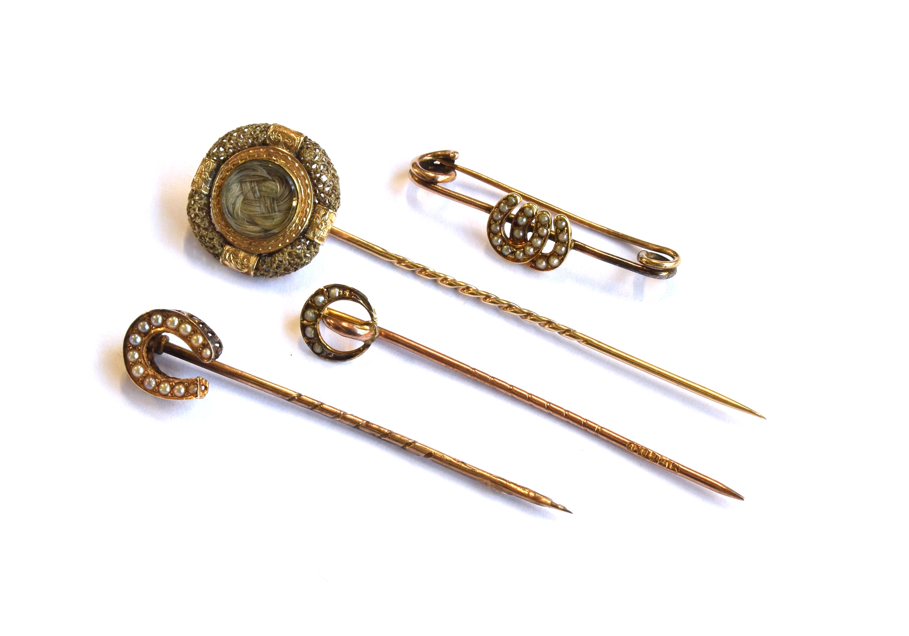 A gold mounted Victorian hair work stick pin, the glazed compartment having plaited hair, surrounded - Image 2 of 2