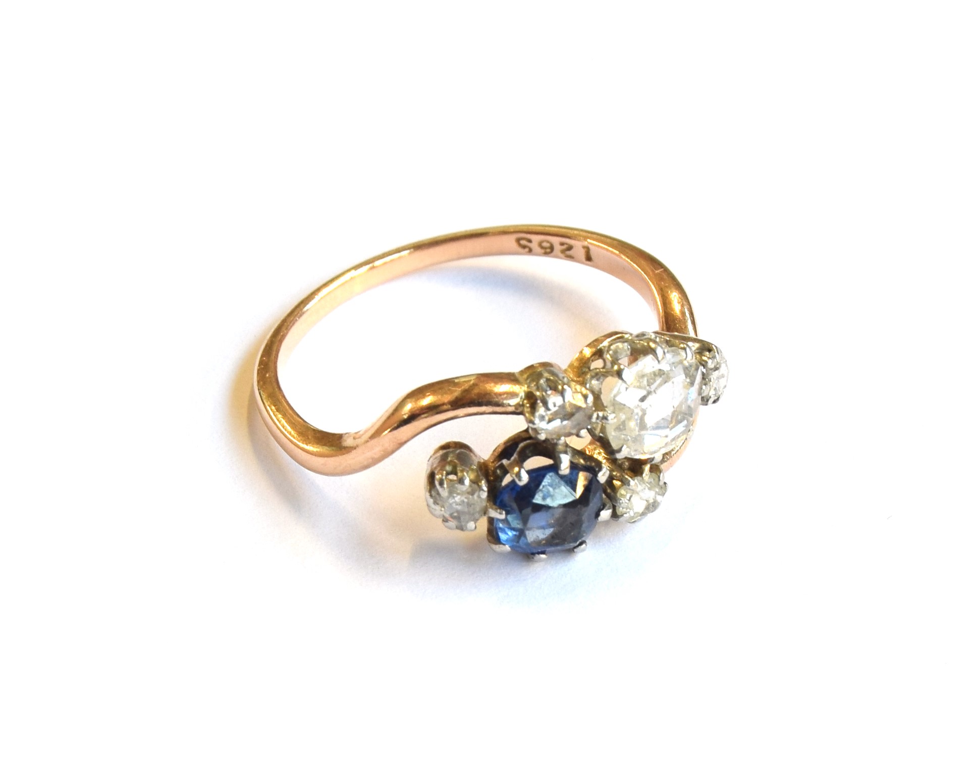 An early 20th century 18ct gold 'Toi et Moi' diamond and sapphire crossover ring, the large rose cut - Image 6 of 6