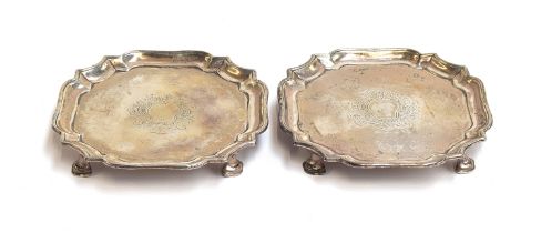 A pair of George II shaped silver salvers by Augustine Courtauld I, London 1733, each having