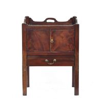 A George III mahogany night stand, three quarter gallery with handles, over cupboard and converted