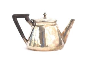 An Edwardian silver bachelor's teapot, London 1908, of conical form, with straight spout, 10cm high,