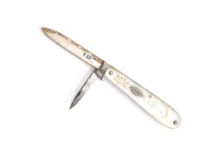 A George III silver, steel, and mother of pearl penknife, having a large silver blade, 6cm long, and