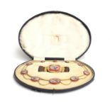 A Victorian Grand Tour micro mosaic demi parure in fitted case, comprising a gold mounted riviere