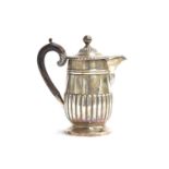 A small late Victorian silver coffee pot, by Henry Stratford, London 1899, gadrooned rim, wooden