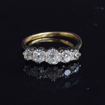 An 18ct gold diamond five stone ring, the five old cut diamonds totalling approx. 1.6cts, size P,