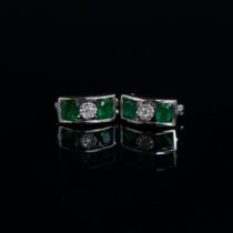 A pair of 14ct white gold, emerald and diamond earrings, total carat weight of the four emeralds