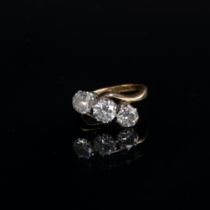 An 18ct gold and diamond trilogy crossover ring, total carat weight approx. 1.6cts, size K,