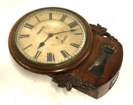 An early 20th century wall clock from a Police station, by Tanner of Lewes, with Roman numerals, 11"