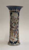 A Chinese Mandarin style sleeve vase depicting boating scenes, later clobbered decoration, 27cmH