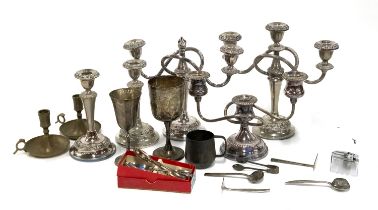 A mixed lot of silver plate to include three arm candlesticks; brass candlesticks; Streamline