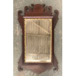 A mahogany fret carved mirror in 18th century style, bevelled glass, 74cmH