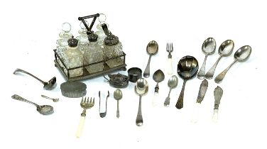 A mixed lot to include silver mustard and napkin ring; silver plated cruet set; flatware etc