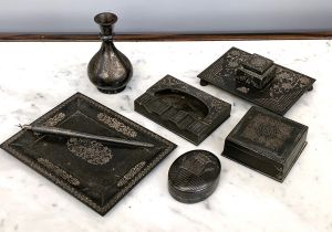 A collection of six Indian bidri desk items, to include a vase, 10cmH, inkwell, lidded pot etc