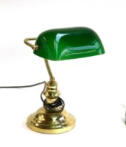 A gilt metal and green glass bankers lamp