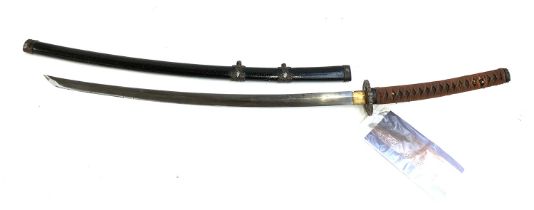 A samurai sword, signed, with damascened blade, the blade 75cmL