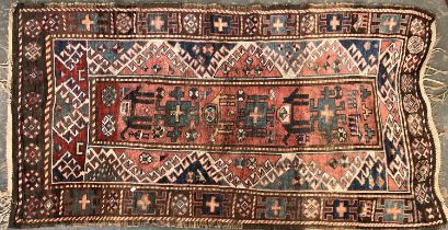 A tribal rug, 116x210cm