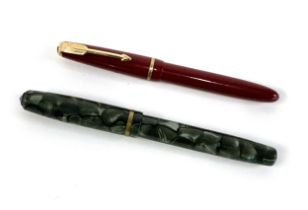 A Burnham B48 fountain pen with B45 fine nib; together with a Parker pen