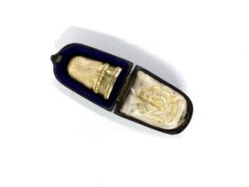 A Victorian gold thimble, 2.2cm high, 5.3g, in fitted box