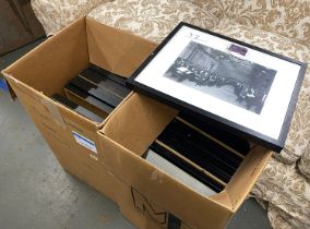 22 large black and white framed photographs in two boxes, each frame approx. 55x45cm overall