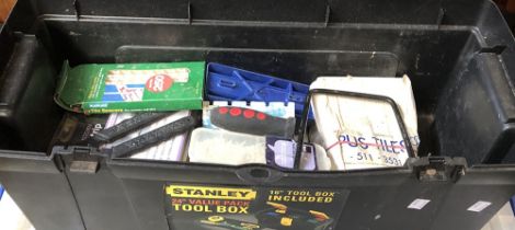 A Stanley toolbox containing tile cutter etc; together with a Mitre saw