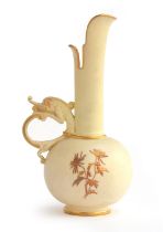 An early 20th century Royal Worcester blush ivory Persian style ewer with dragon handle,