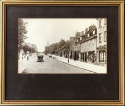 Local interest: an early 20th century black and white photograph of West Street, Bridport, 15x24cm