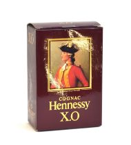 Hennessy X.O Cognac, circa 1970s, in original box and sealed wrapping, 70cl