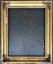 A very large gilt gesso picture frame, in need of restoration, 118x99cm, internal measurements