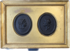 Two late 18th century Wedgwood black basalt portrait cameo plaques, each 7.5x5.6cm, mounted in a